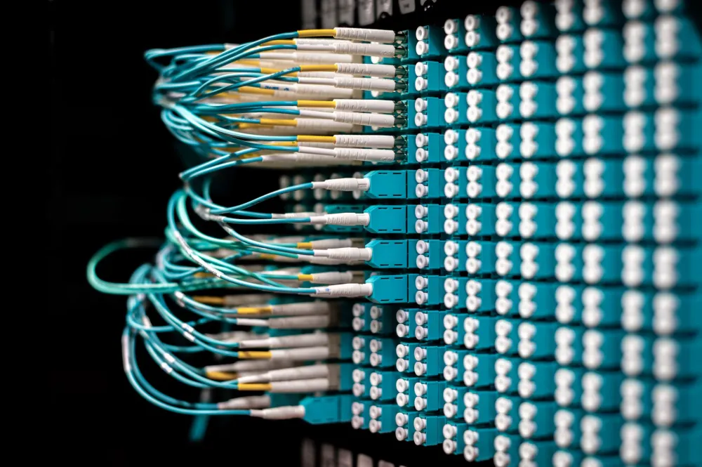 Technician installing Cat6 structured cabling during an office IT upgrade in Dubai