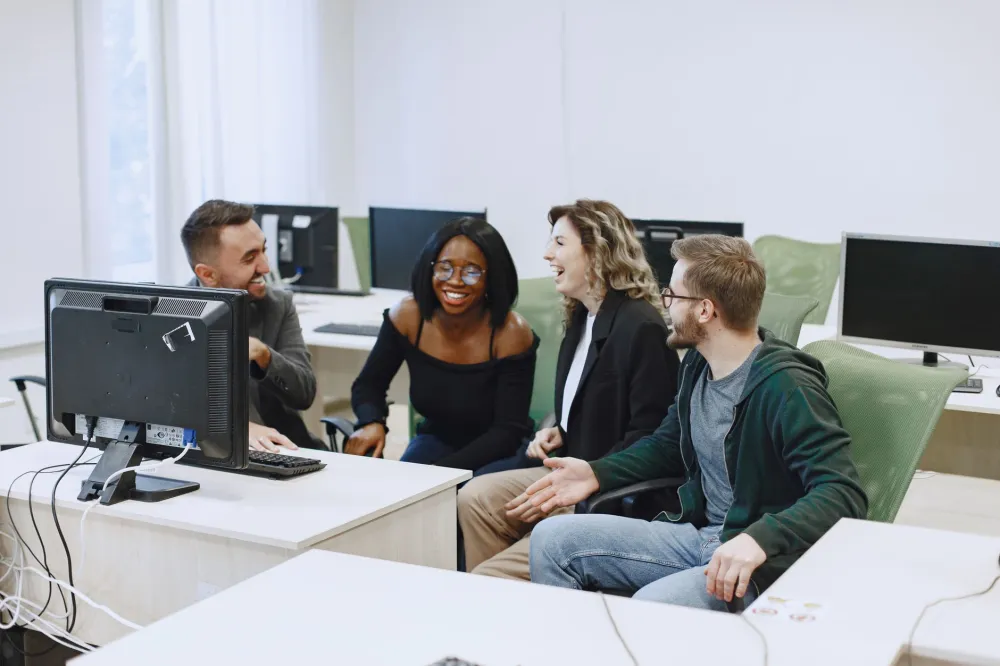 Office team working on computers supported by managed IT services near Dubai Digital Park