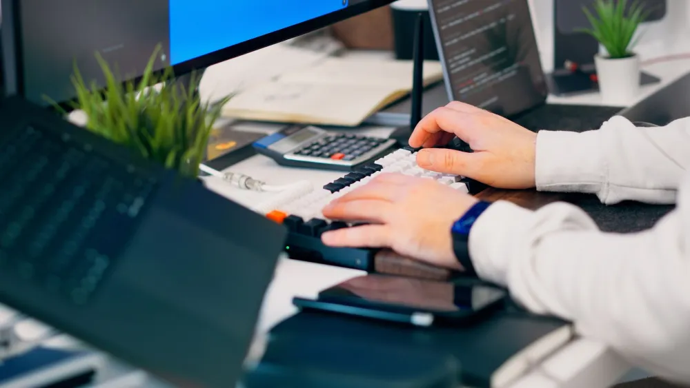 IT security engineer configuring access control and CCTV system for a Dubai office