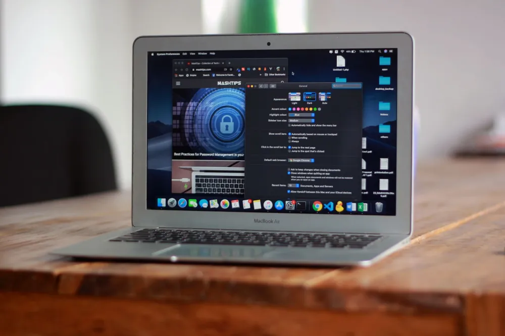 macOS setup and configuration on a MacBook Pro in a modern Dubai office
