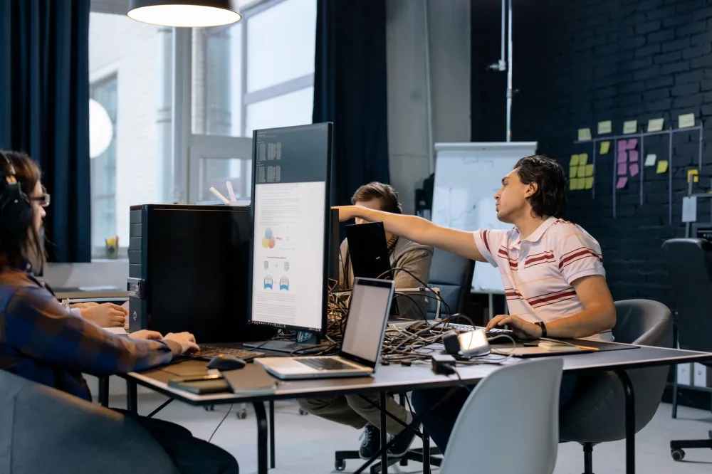 Staff using Microsoft 365 collaboration tools recommended by IT consulting services