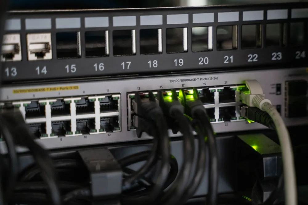 Technician configuring office router for business network setup in Dubai