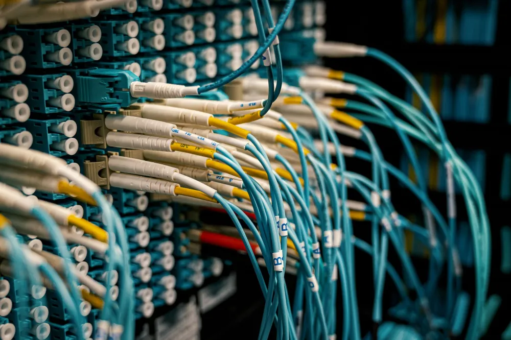 Cat6 structured cabling installed in a server room during office network setup