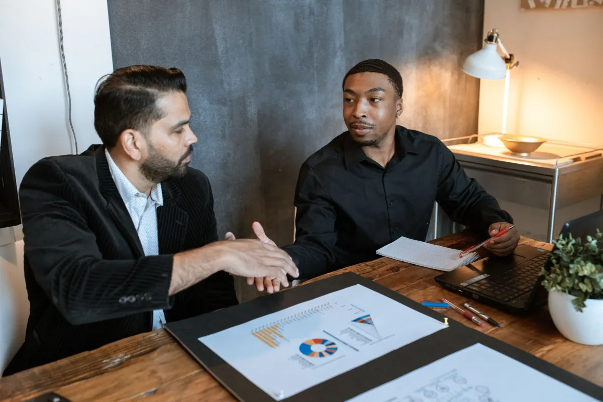 Business owner asking questions before hiring an IT company in Dubai office