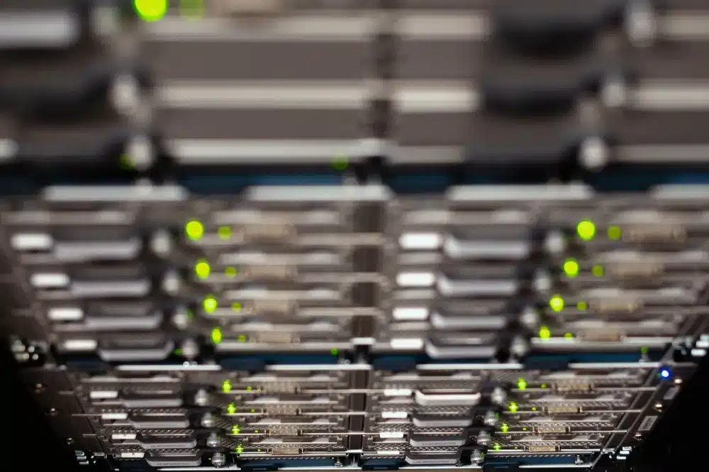 IT engineer configuring a Synology NAS device during a Discovery Gardens office setup