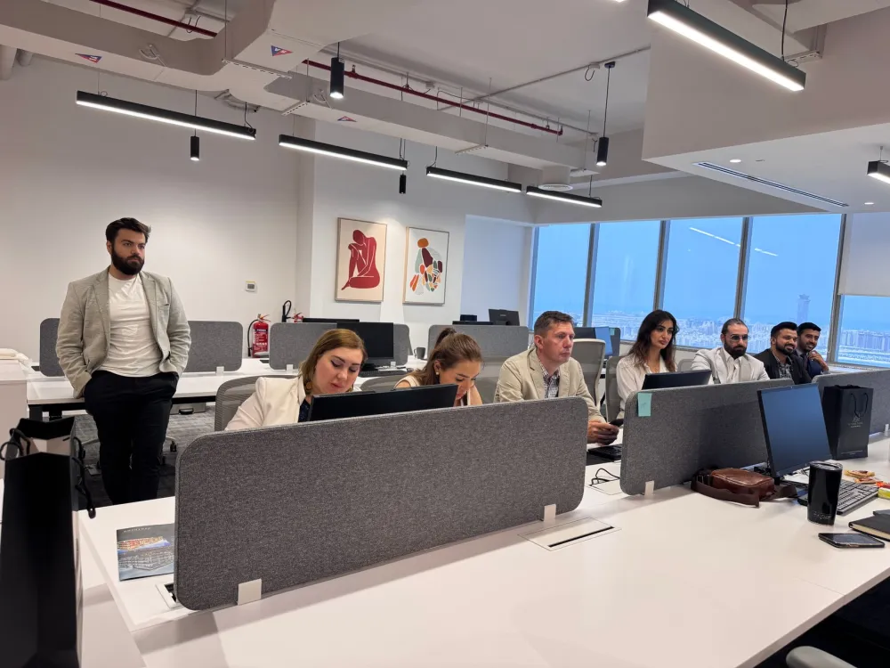 Office team working on computers connected to a Windows Server shared network