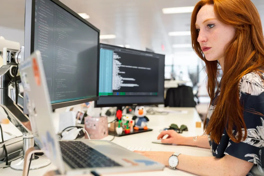 On-site IT support engineer assisting a business owner in a JLT office