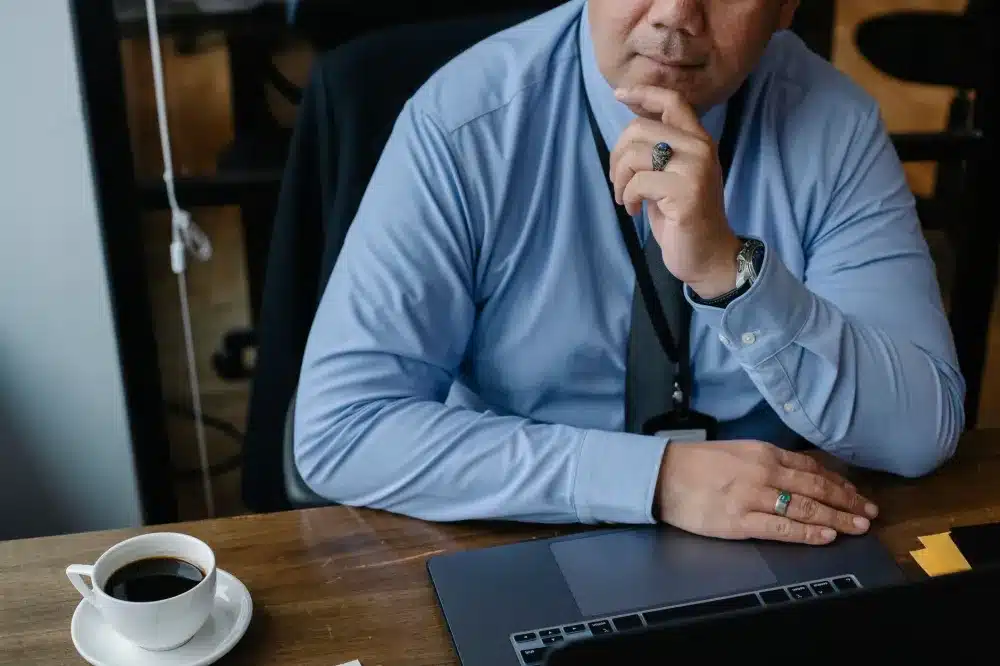 Business owner consulting with IT support engineer about network security in Dubai Hills