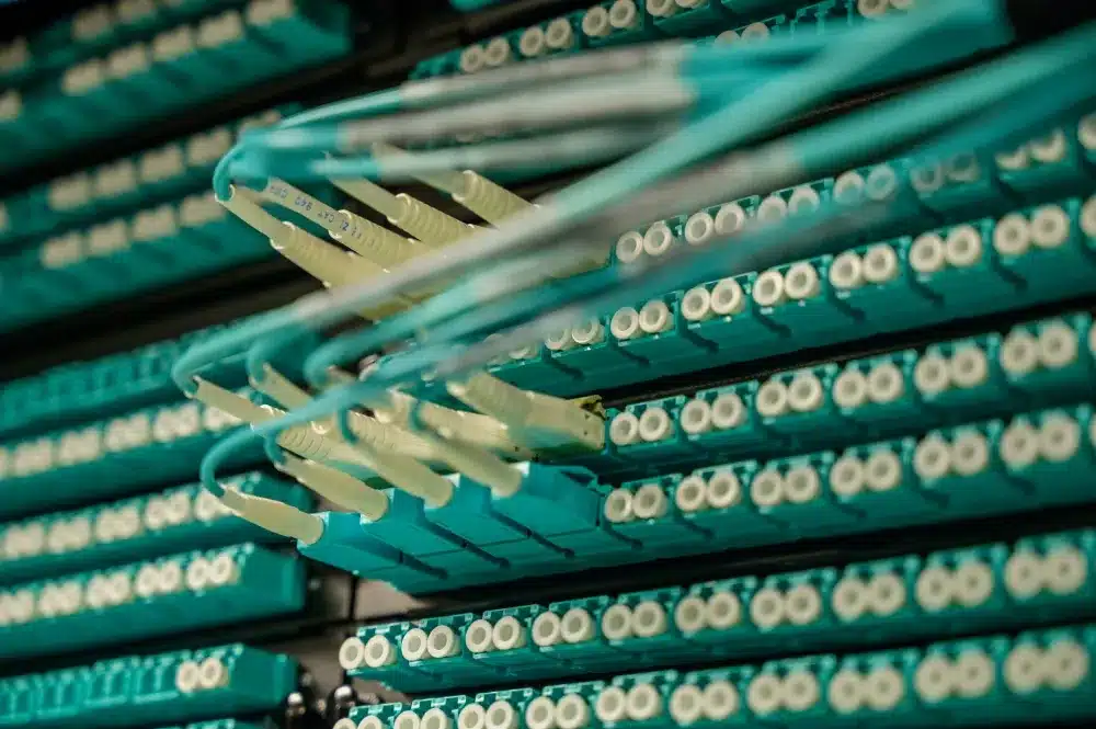 Structured network cabling and switch rack in a Dubai office server room