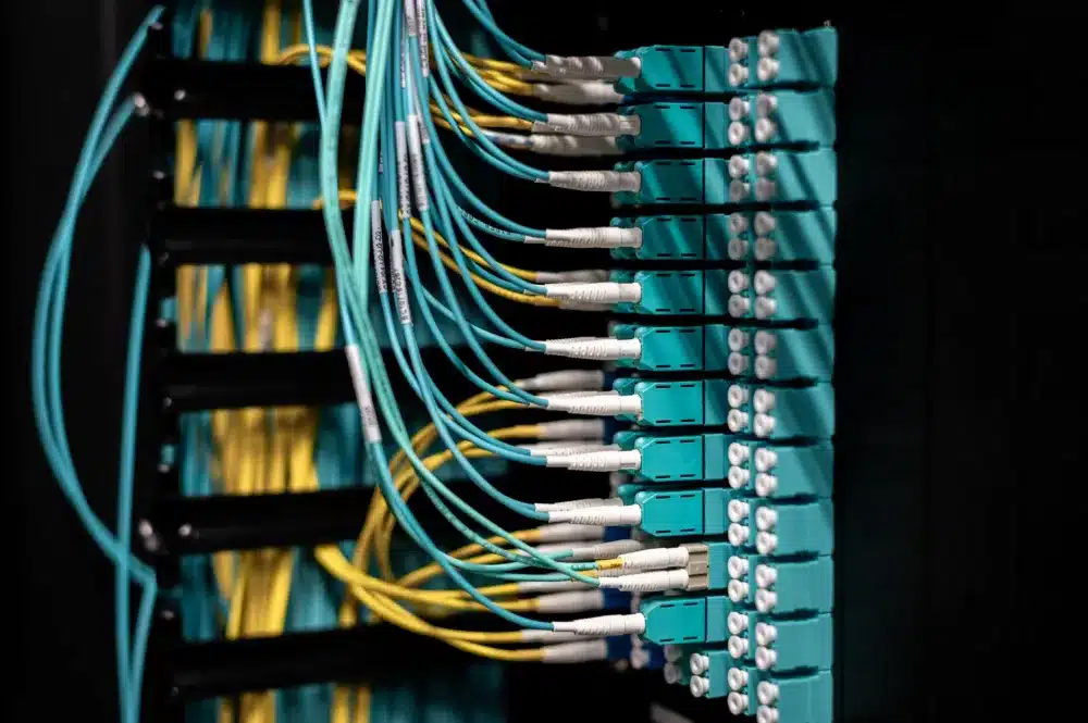 Technician configuring a Windows Server in a Dubai office server room