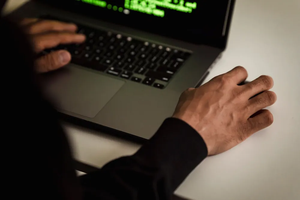IT engineer diagnosing network issues proactively at a Dubai Internet City office