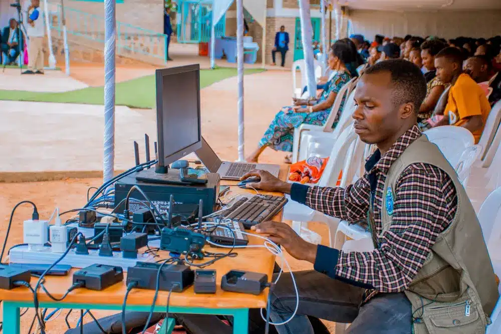 IT technician activating software licences on a business laptop for a Dubai SME