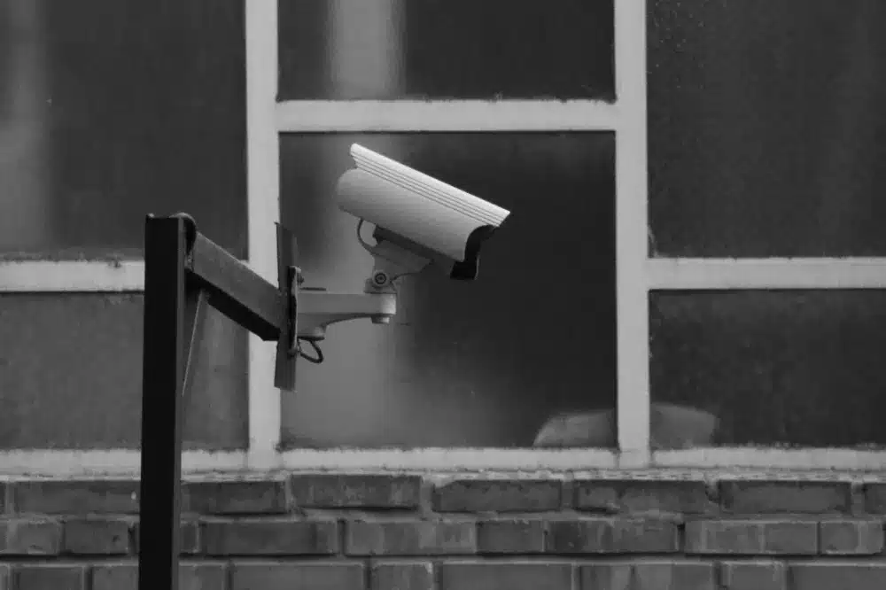 Outdoor IP security camera mounted on a commercial building exterior in Dubai