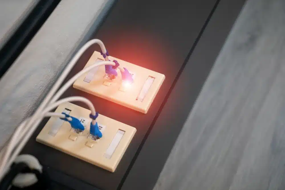 Structured network cabling and switch setup in a modern Dubai Internet City office