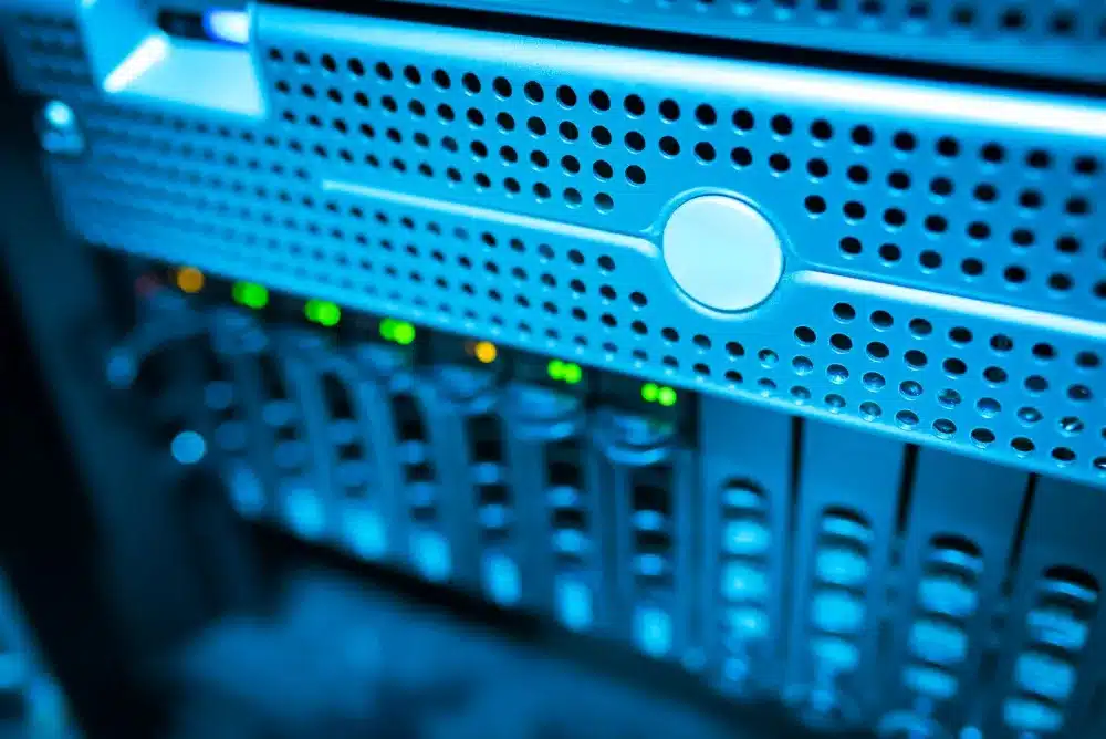 Small office server room with NAS backup device alongside Windows Server hardware